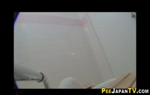 Japanese ho pees in public toilet